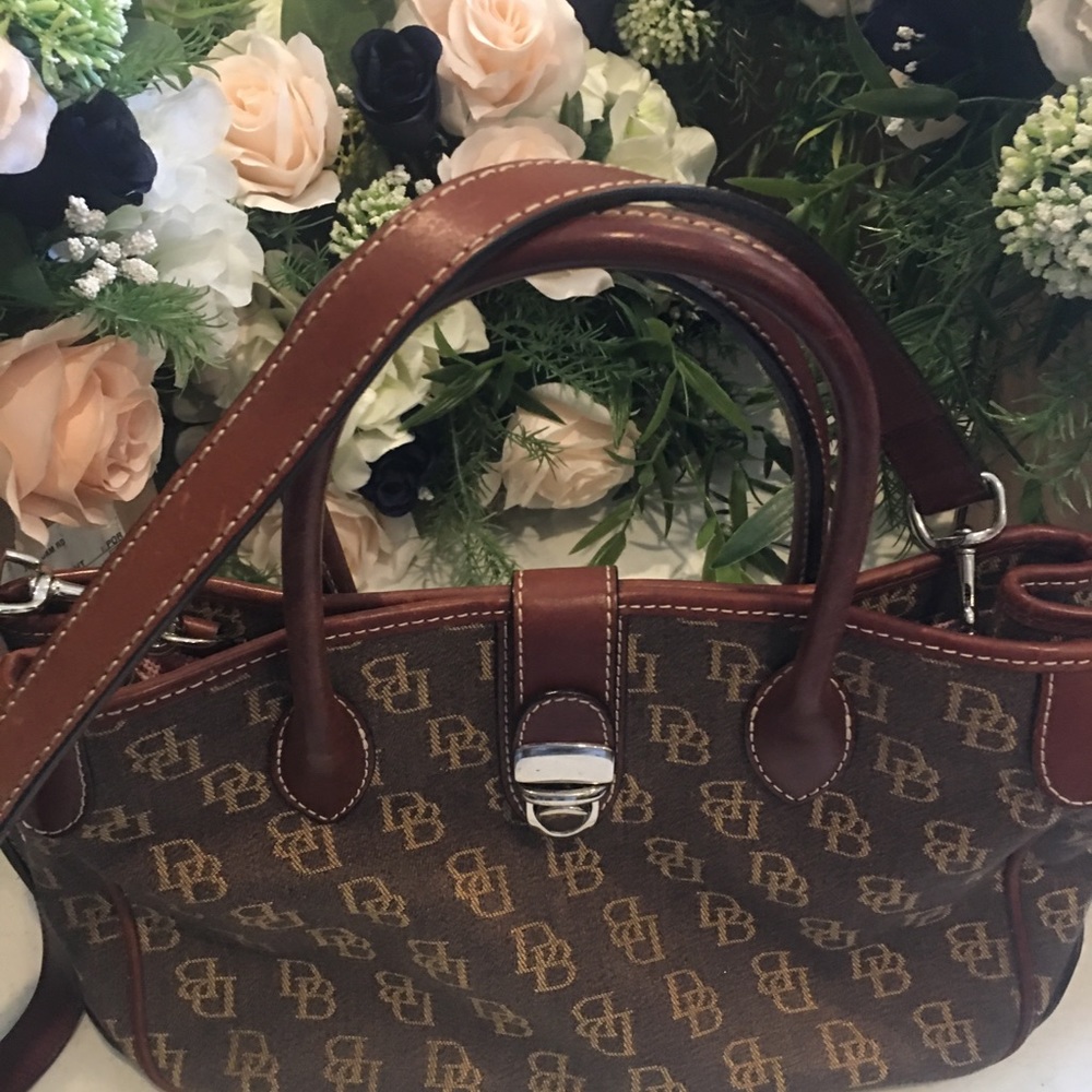 Handbag with shoulder strap. Like new condition. No handle or strap wear. Clean